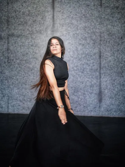 A graceful turn, with my hair flowing as an extension of the movement.