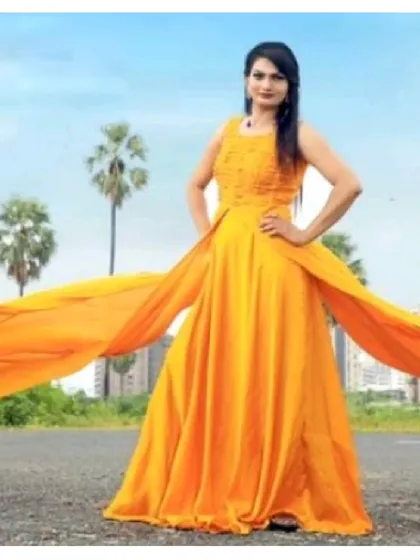 Let your spirit fly in this gorgeous yellow gown with a long, flowing trail. It's one of our most popular choices for pre-wedding photoshoots, creating stunning, dramatic pictures.