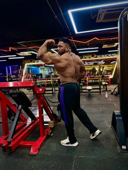 Back double bicep. The success is visible from every angle.