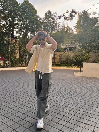 Another lifestyle shot of the leopard swoosh custom sneakers being worn.