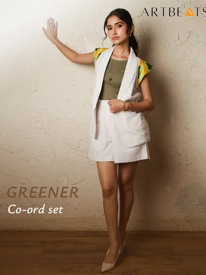 The Greener Co-ord set is a statement piece you didn’t know you needed. The handwoven cotton waistcoat with art-infused shoulders can be styled with the matching shorts for a complete look or paired with formal pants for an office event.