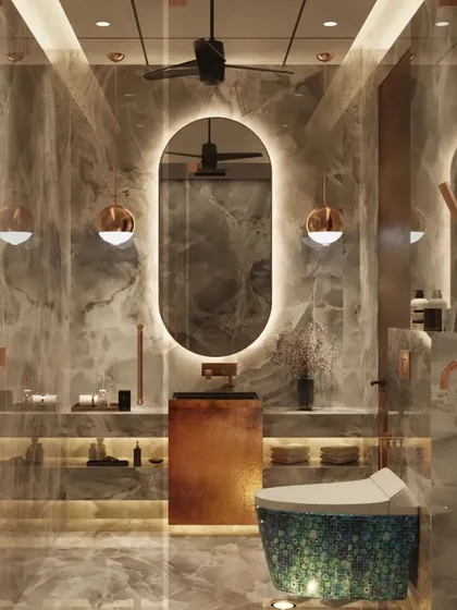 This modern toilet design uses grey marble and rose gold fixtures to create a look of understated luxury. The oval backlit mirror and unique pendant lights add a touch of glamour, while the custom vanity provides ample storage.