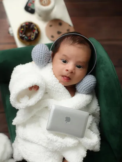 Newborn sessions can be playful too. This "Netflix and Chill" spa day theme is a perfect example of how we can personalize a shoot to reflect your family's fun personality.