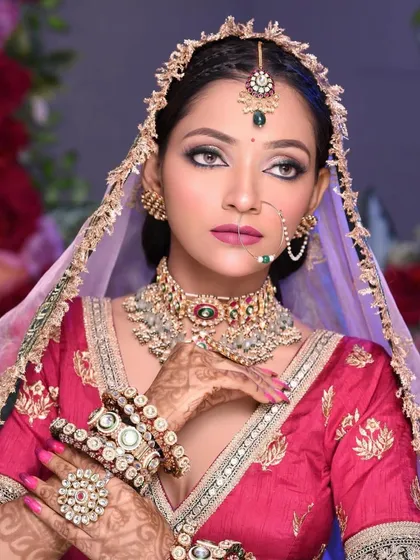 A striking pose from the same bride, showcasing her confidence and the elegance of the complete look.