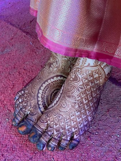 A lovely shot of the bridal feet, adorned with intricate henna. A symbol of the beautiful steps she is about to take in her new life.
