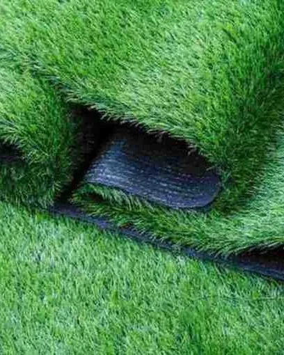 The quality of our turf is visible in its construction. This close-up reveals the dense fibers and robust, multi-layer backing that give our artificial grass its exceptional durability and long-lasting performance.