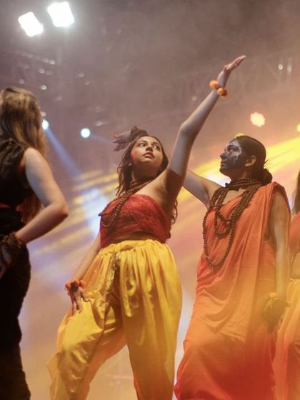 A joyful and energetic group dance performance. This shot captures the spirit of collaboration and celebration that defines college cultural fests.