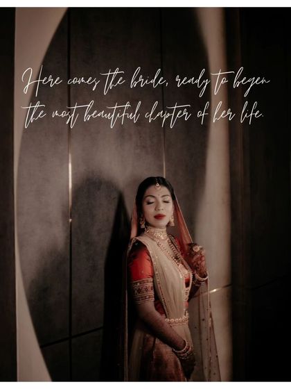 A moody portrait of Alka, with soft shadows falling on her face, her expression serene and thoughtful.