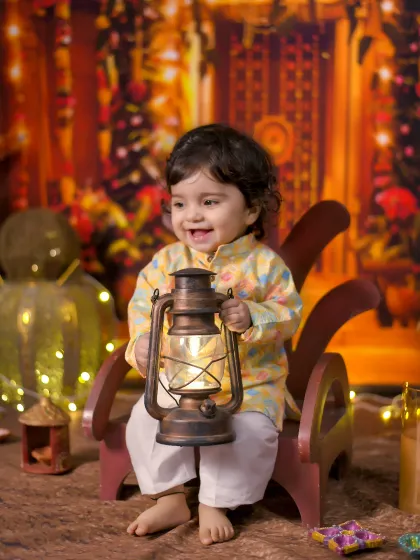 Celebrating the festival of lights with the brightest smile. I offer special themed photoshoots for holidays like Diwali, complete with traditional props and a warm, festive glow.