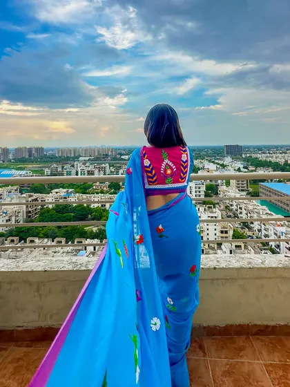 A final shot of the beautiful blouse and saree against the monsoon sky. A truly romantic and aesthetic look.