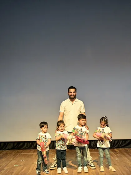 A proud moment with my toddler dance group after they rocked their first stage show. Seeing their confidence is the biggest reward.