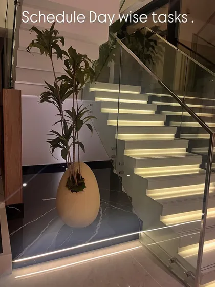 Scheduling our day-wise tasks for the final handover. This beautiful staircase with integrated lighting is one of the stunning features of the Dubai villa that we are excited to complete.