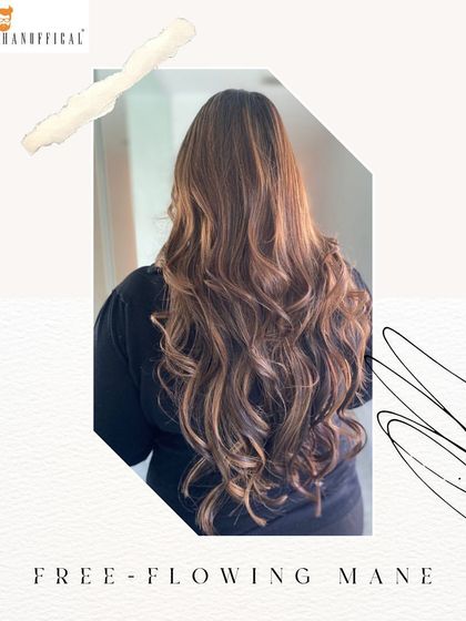 This long, voluminous hair is the perfect canvas for a freehand balayage. The result is a stunning, dimensional look that's full of life.