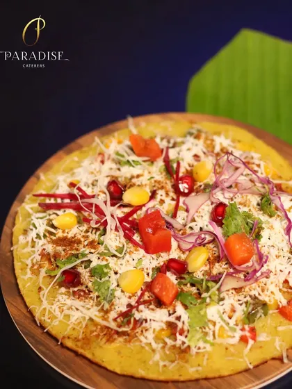 A healthy and flavorful Moonglet Chilla, loaded with fresh vegetables and cheese. It's a nutritious and delicious option from our Indian breakfast menu.