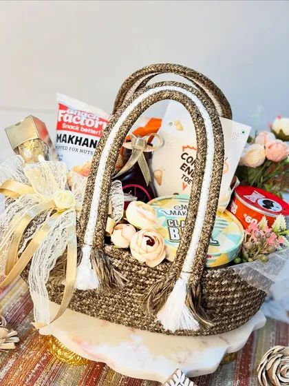 We believe in creating gifts that are both beautiful and useful. This goodie basket, with its sturdy jute handles and thoughtful contents, is a perfect example of our commitment to affordable luxury.