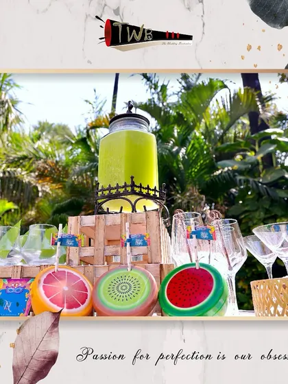 A fun and fruity display of our mocktail station, featuring watermelon, kiwi, and grapefruit-shaped glasses.