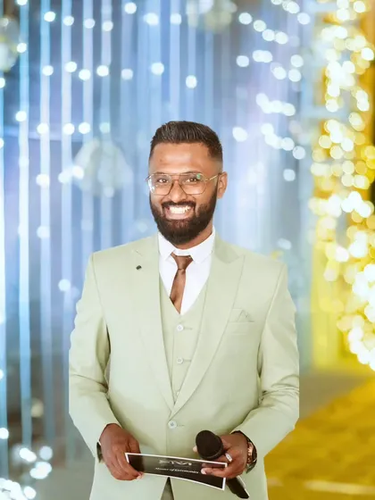 As a planner and an anchor, I am personally invested in the flow and energy of your celebration. Here, I'm hosting Ryan and Ela's reception, ensuring the evening is not just well-organized but also filled with genuine connection, laughter, and joy.