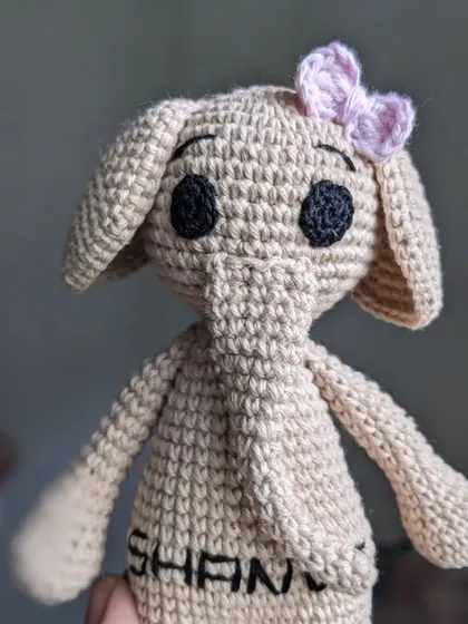 A custom elephant doll with the name 'Shanvi' embroidered on its belly.