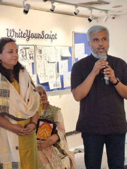 Artist Nikheel Aphale speaks at the opening of the "Scripted Dialogues" exhibition. We provide a platform for artists to share the stories and inspirations behind their work directly with the audience.