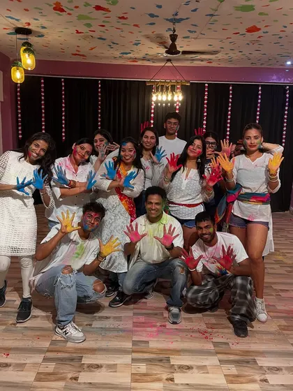 The whole crew with colorful hands after our Holi workshop. These are the memories we cherish.