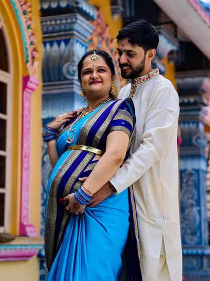 A lovely couple's portrait taken during their maternity ceremony. I guide my clients into poses that feel natural and highlight their connection.