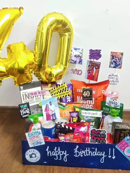 Turning 40 is fabulous, and this hamper is all about celebration. It's packed with snacks, drinks, and fun personal touches, complete with large '40' foil balloons to make a bold and festive statement.