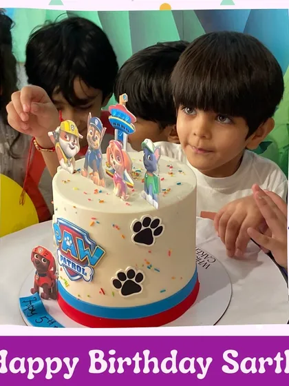 Happy Birthday, Sarth. The birthday boy surrounded by friends, ready to cut his Paw Patrol cake.