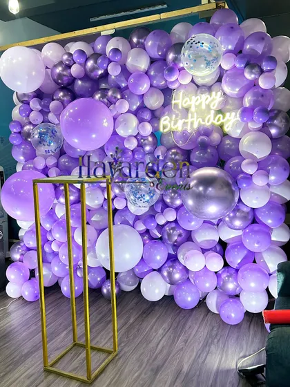 Another view of the lavender balloon wall, showing the texture and depth created by using balloons of different sizes.