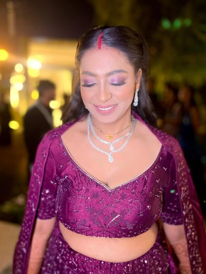Minimalism at its best for this gorgeous reception bride. We focused on a stunning purple smokey eye and let her natural beauty shine, proving that sometimes less is more.