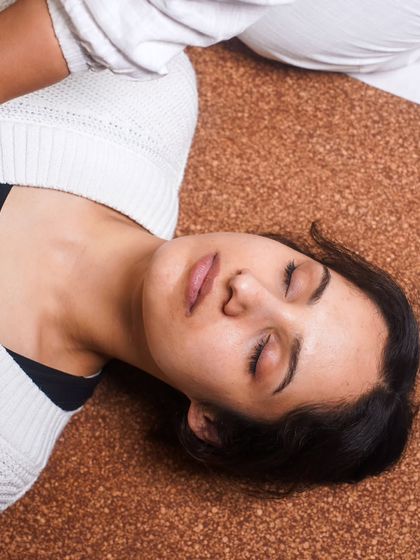 A moment of deep relaxation in Savasana. Asana practice prepares the body for meditation, and moments of stillness like this allow you to integrate the practice and connect with your inner self.