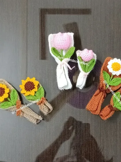 Our mini and XS bouquets laid out to show the different sizes and flower types available, including sunflower, tulip, and daisy.