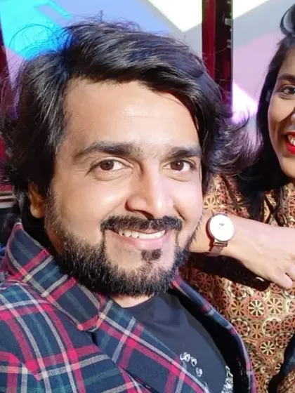 A selfie with my talented co-host after a superhit 25th-anniversary show. We make a great team.
