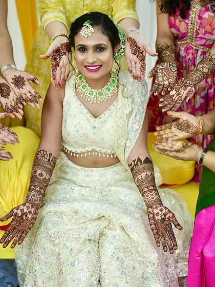 Mehndi is a shared joy, perfect for group celebrations like a sangeet or Diwali party. I love creating complementary designs for the bride and her entire tribe, making sure everyone feels part of the festive spirit.