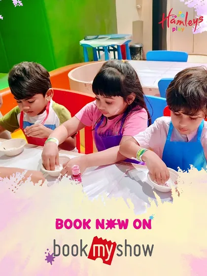 Three young artists are completely focused on mixing their own Holi colors. I provide all the safe materials so they can dive into the creative process without any worries.