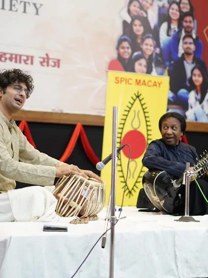 Interacting with the audience during a SPIC MACAY concert with Ustad Shahid Parvez Khan Sahab. These concerts are vital for introducing the next generation to our rich classical traditions.