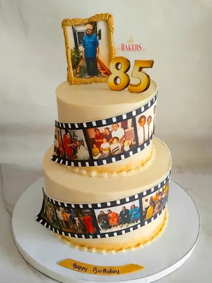 This cake was for a very special 85th birthday, and we wanted it to tell a story. I designed this two-tier cake with an edible photo reel showcasing precious memories from over the years. It’s a beautiful way to personalize a celebration, and this one was a fresh fruit cake, made with absolutely no fondant.