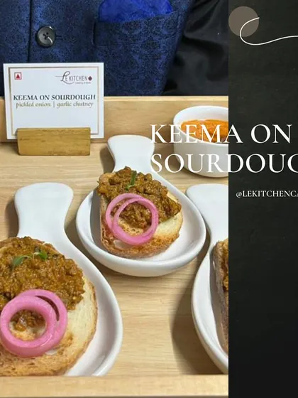 Keema on Sourdough, a hearty and flavorful appetizer featuring spiced minced meat served on a crisp slice of toasted sourdough with pickled onions.