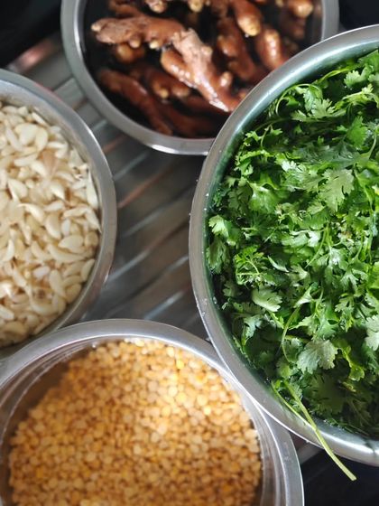 The basics of so many of my mother's recipes. Freshly chopped garlic, ginger, coriander, and lentils form the 'vatan' or paste that is the base of many Maharashtrian curries.