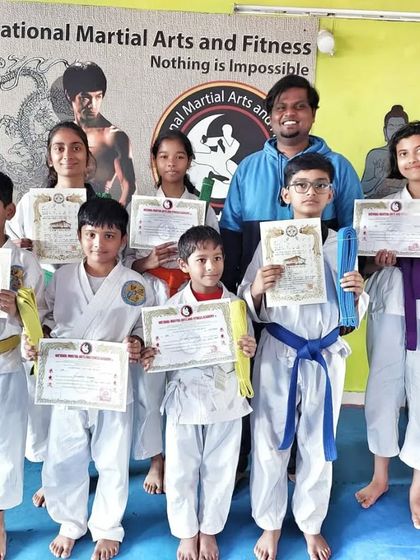 National Martial Arts and Fitness Academy - Kids Martial Arts & Fitness The Journey of Discipline: Belt Graduations photo 29
