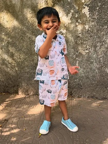 Smiles, sunshine, and the comfiest outfit ever! This playful elephant print set is perfect for your little explorer, keeping them cool and carefree all day long.