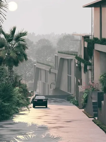 The entrance road to the Moira Homes winds along the base of the slope. The retaining walls are built from local stone, grounding the modern architecture in its context and managing the level differences across the site.