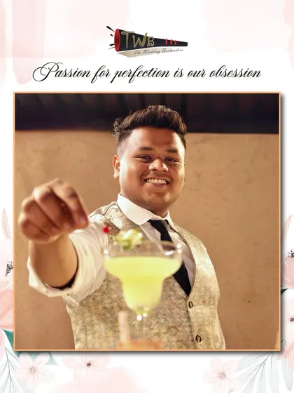 A bartender presents a freshly made margarita, a classic cocktail perfect for any celebration.
