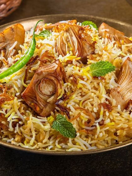 A vegetarian jackfruit biryani, styled with fresh mint, for Punjab Grill's diverse menu.