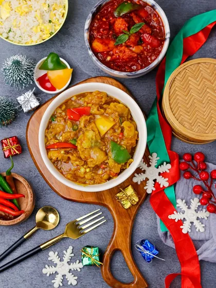 A festive Christmas meal packed for delivery, showing that special occasion food can also be enjoyed at home.