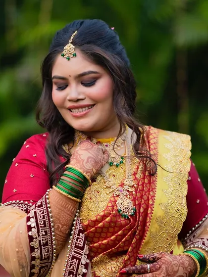 A serene and happy bride. The soft glam makeup enhances her natural beauty and gives her a radiant glow.