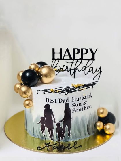 A heartfelt birthday cake celebrating a man as a dad, husband, son, and brother.