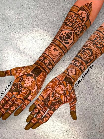 This design beautifully combines personal portraits with spiritual elements. It includes a couple portrait, a depiction of a woman praying, a Ganesha figure, and the couple's initials.