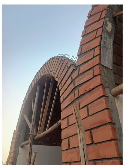 The Brick Vault House: Adaptive Reuse & Monumental Forms photo 11