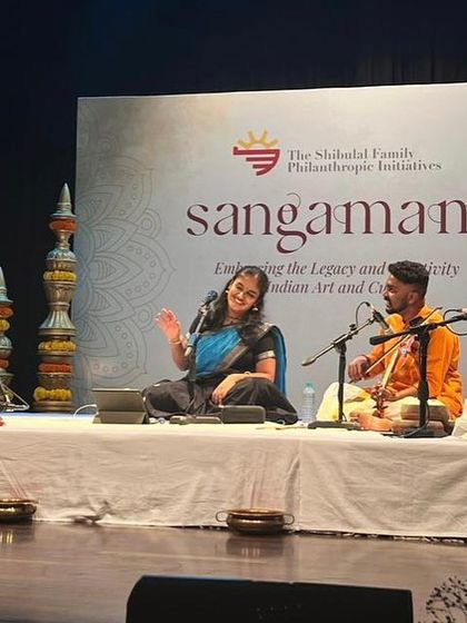 A happy, interactive moment on stage during the Sangamam concert. While the music is serious, the joy of creating it together is always present.