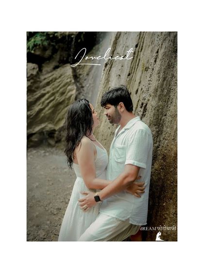 A close-up, intimate portrait of the couple by the waterfall, titled "Loveliest," capturing a moment of pure affection and romance.
